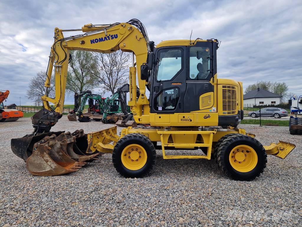 Komatsu PW 118 MR-8 حفارات بعجل
