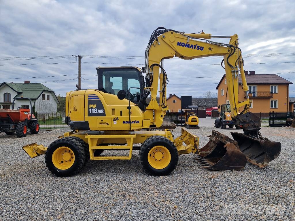 Komatsu PW 118 MR-8 حفارات بعجل