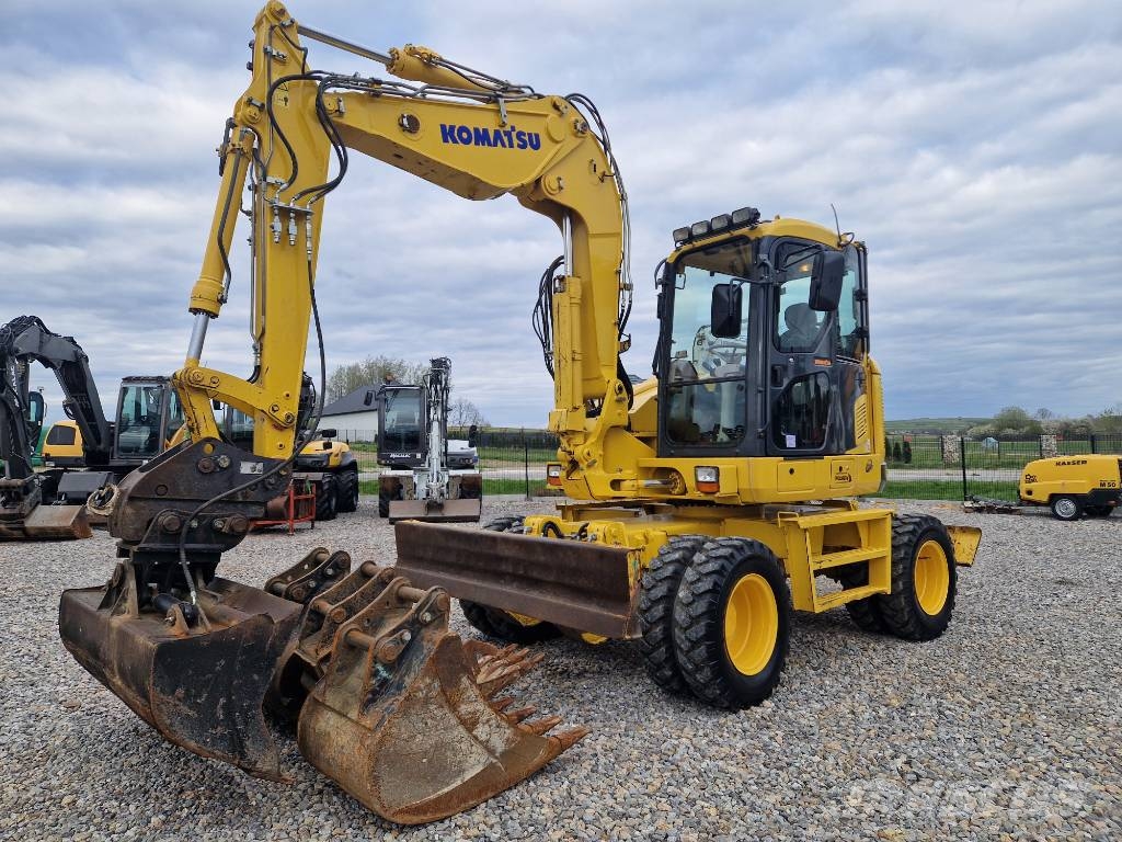 Komatsu PW 118 MR-8 حفارات بعجل