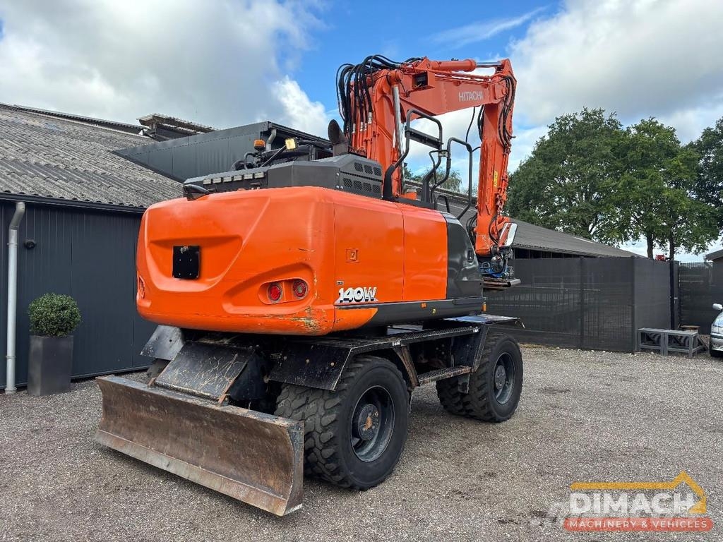 Hitachi ZX140W-6 SMP tiltrotator with grapple - air condit Escavadeiras especiais