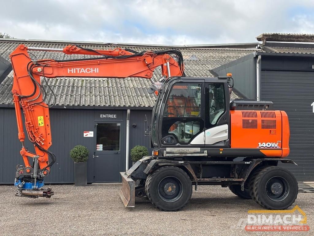 Hitachi ZX140W-6 SMP tiltrotator with grapple - air condit Escavadeiras especiais