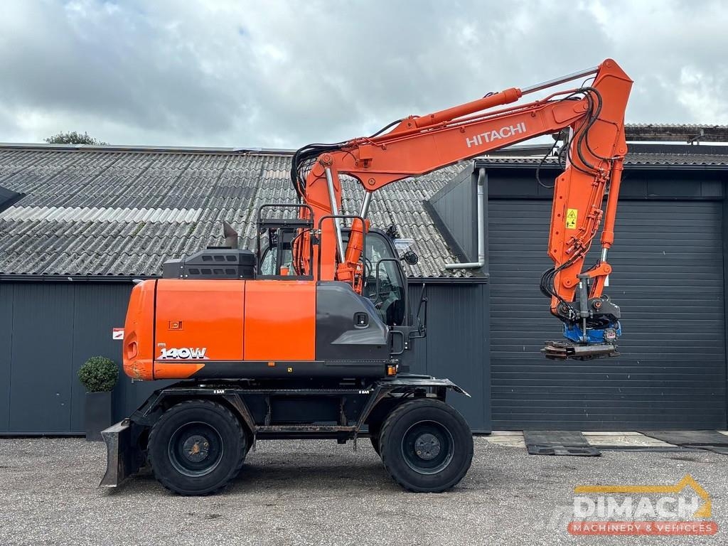Hitachi ZX140W-6 SMP tiltrotator with grapple - air condit Escavadeiras especiais