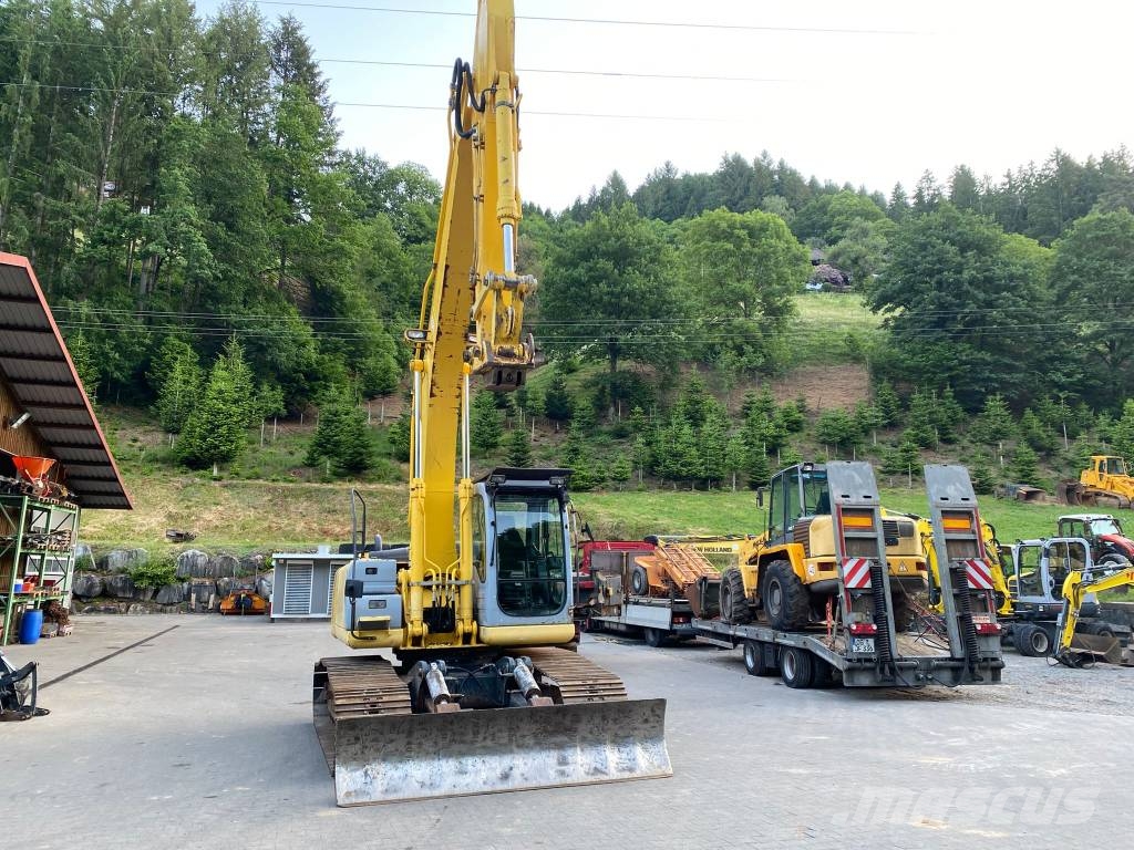 New Holland E 215 B Rupsgraafmachines