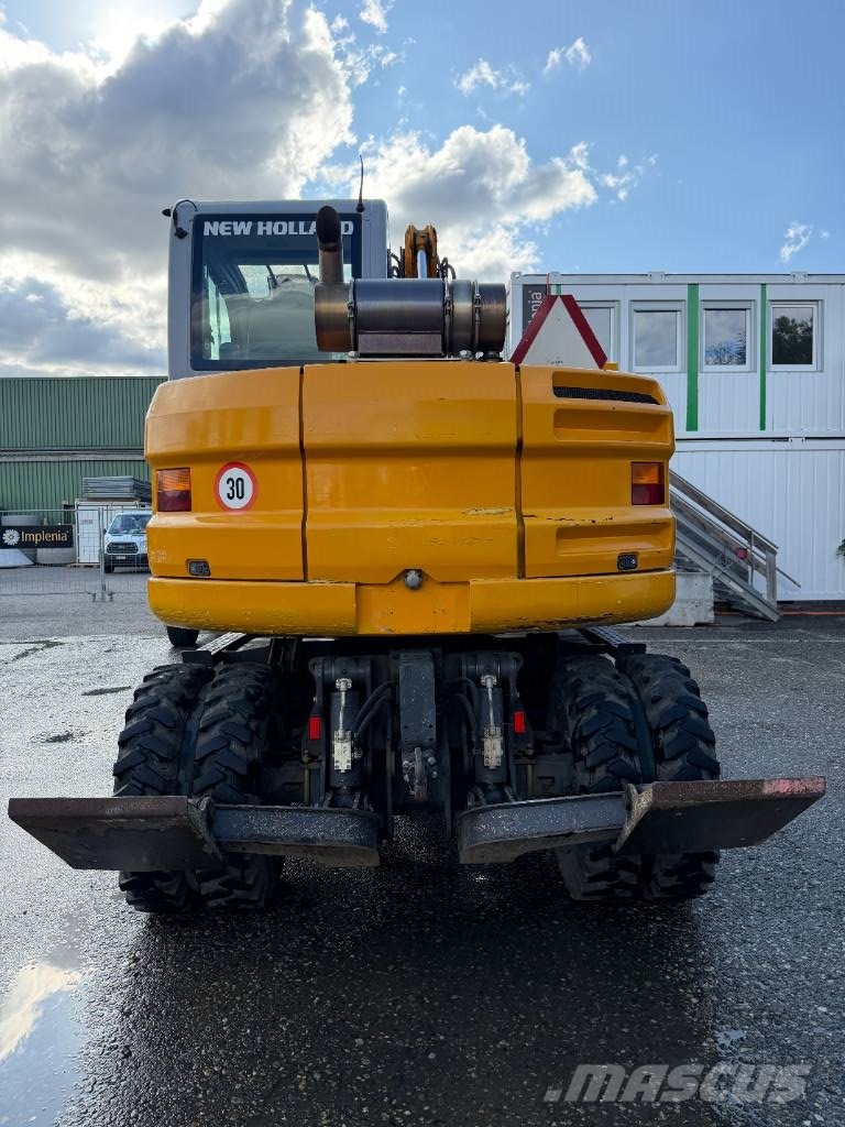 New Holland MH 2.6 حفارات بعجل