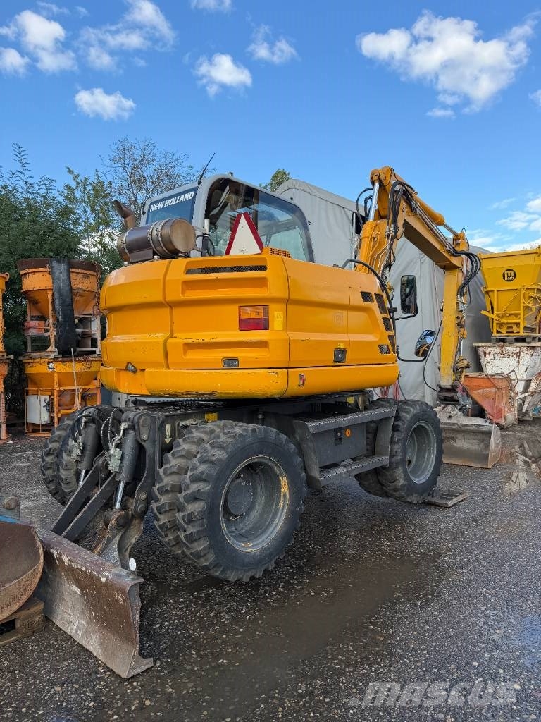 New Holland MH 2.6 حفارات بعجل
