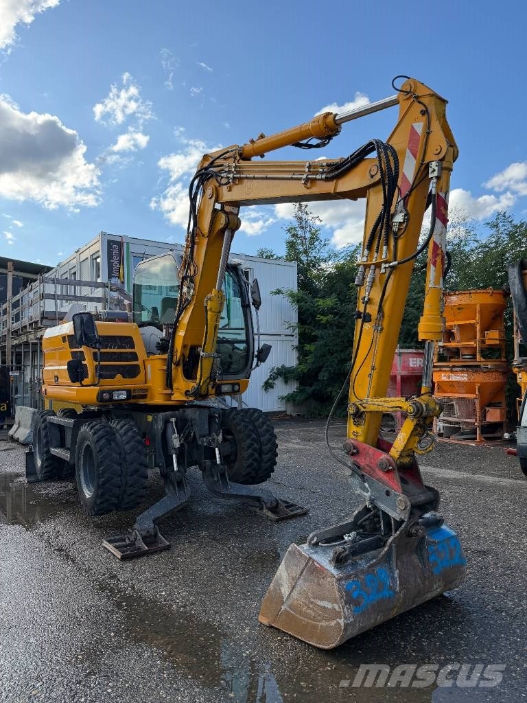 New Holland MH 2.6 حفارات بعجل