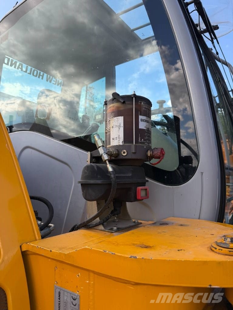New Holland MH 2.6 حفارات بعجل