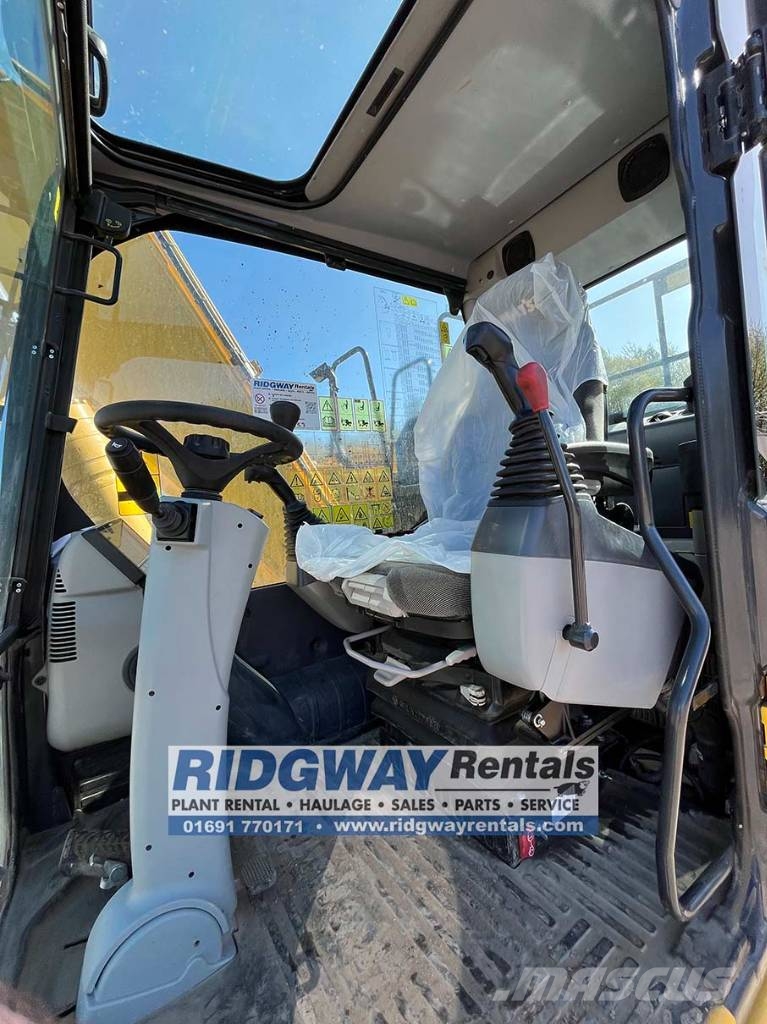 Komatsu PW 148-11 حفارات بعجل