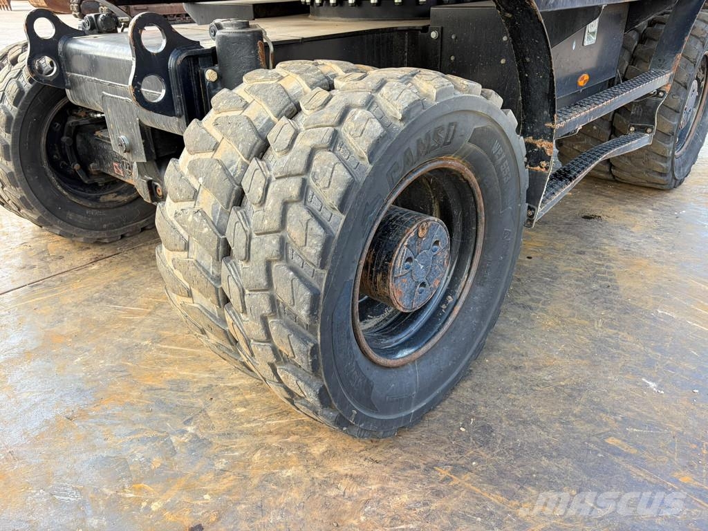 CAT M320F Pelle sur pneus