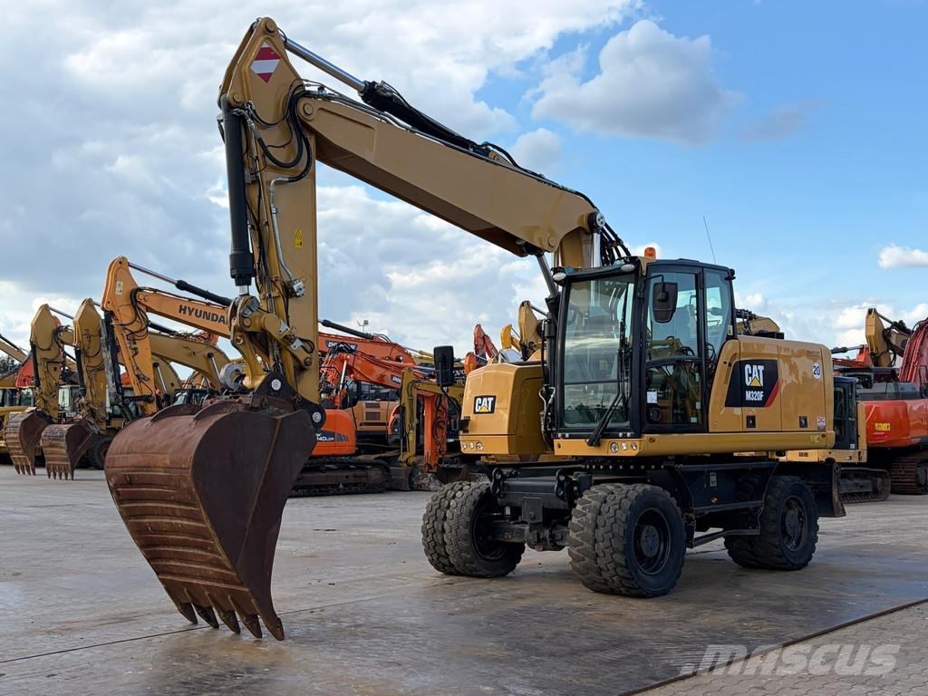 CAT M320F Pelle sur pneus