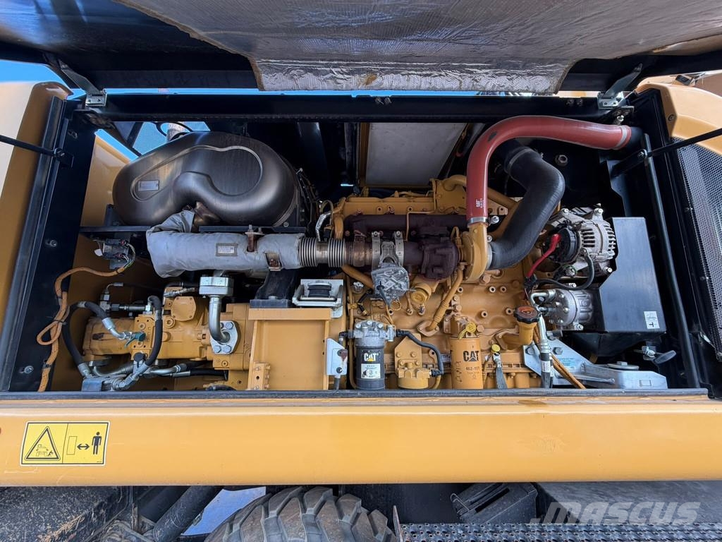 CAT M320F Pelle sur pneus