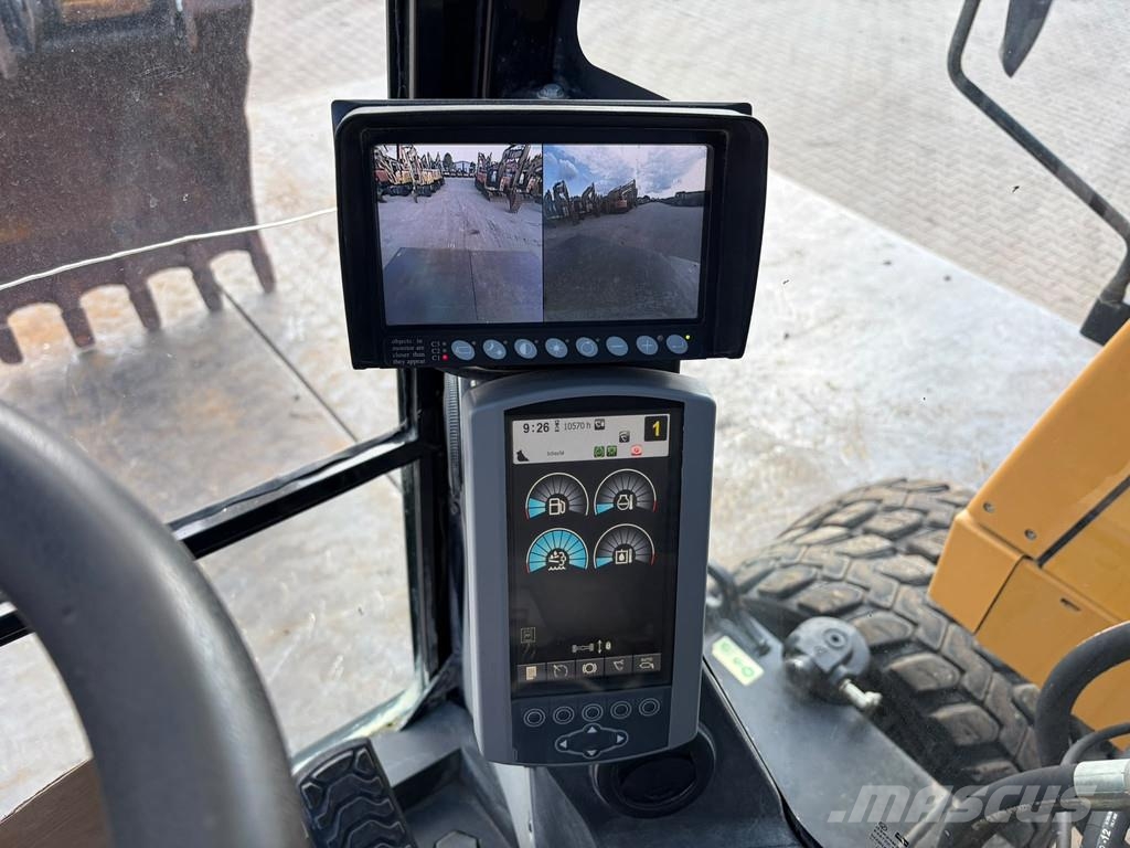 CAT M320F Pelle sur pneus