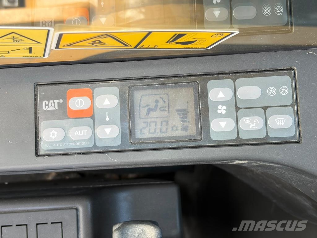 CAT M320F Pelle sur pneus