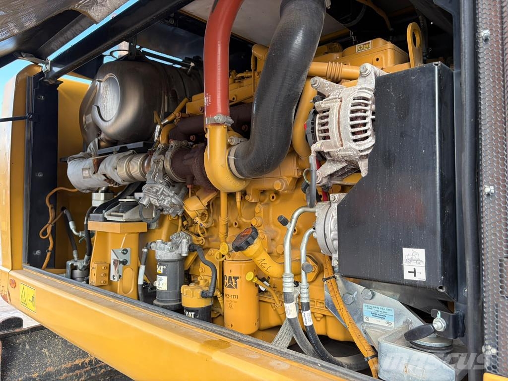 CAT M320F Pelle sur pneus