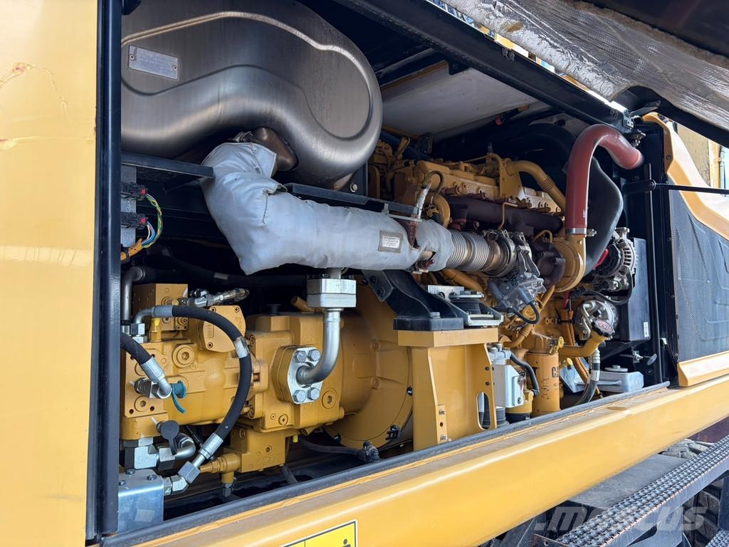 CAT M320F Pelle sur pneus