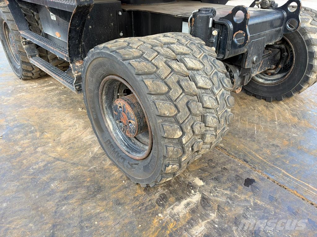 CAT M320F Pelle sur pneus