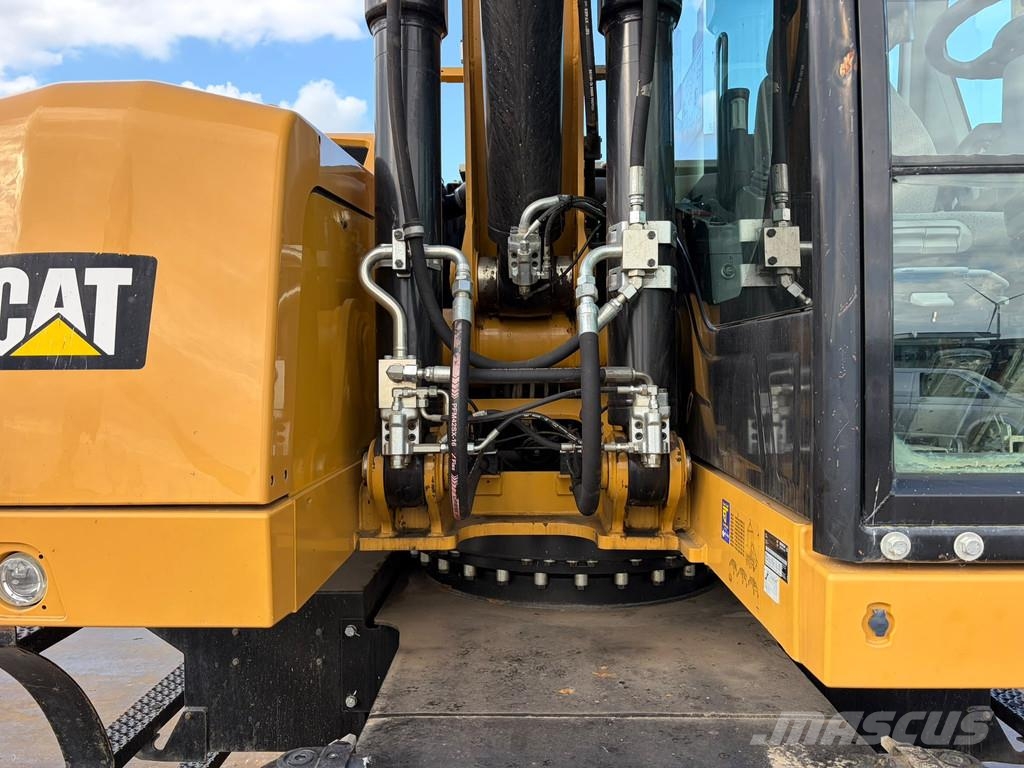 CAT M320F Pelle sur pneus