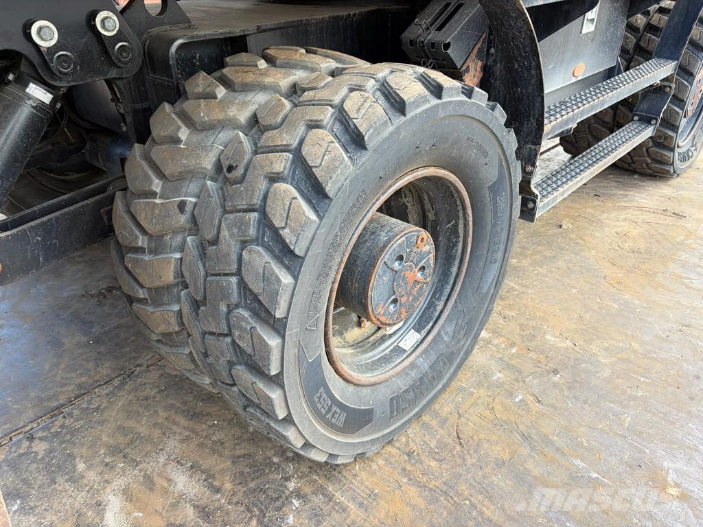 CAT M320F Pelle sur pneus