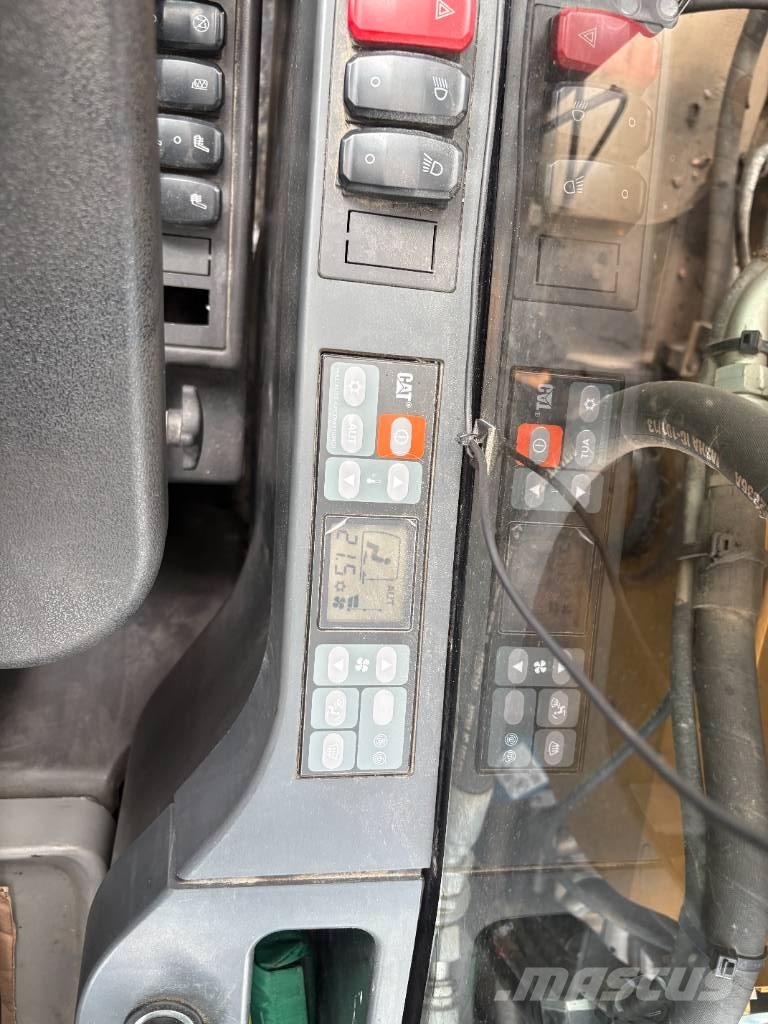 CAT M 317 حفارات بعجل