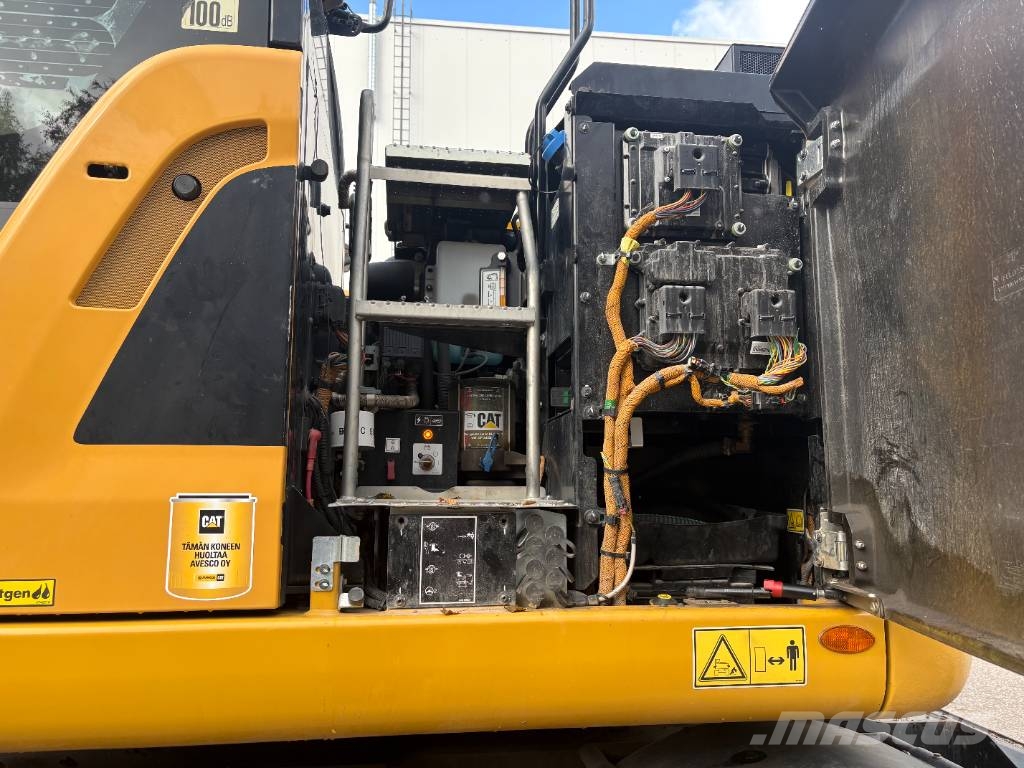 CAT M 317 حفارات بعجل