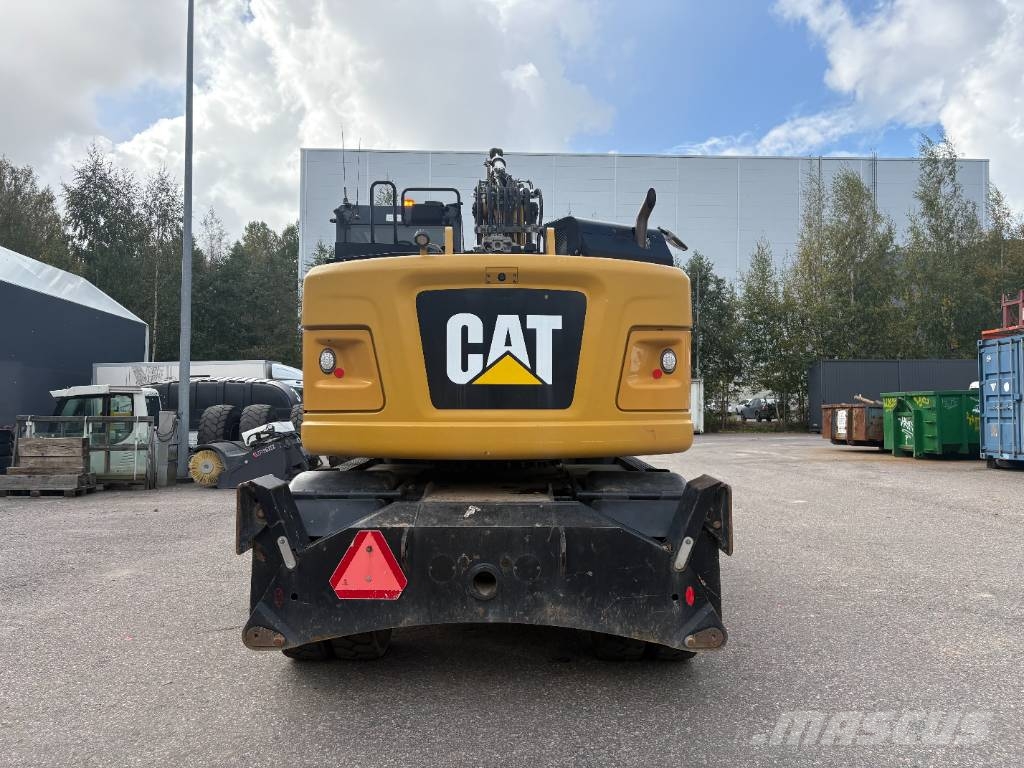 CAT M 317 حفارات بعجل