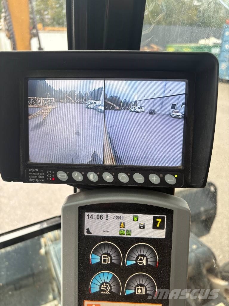 CAT M 317 حفارات بعجل