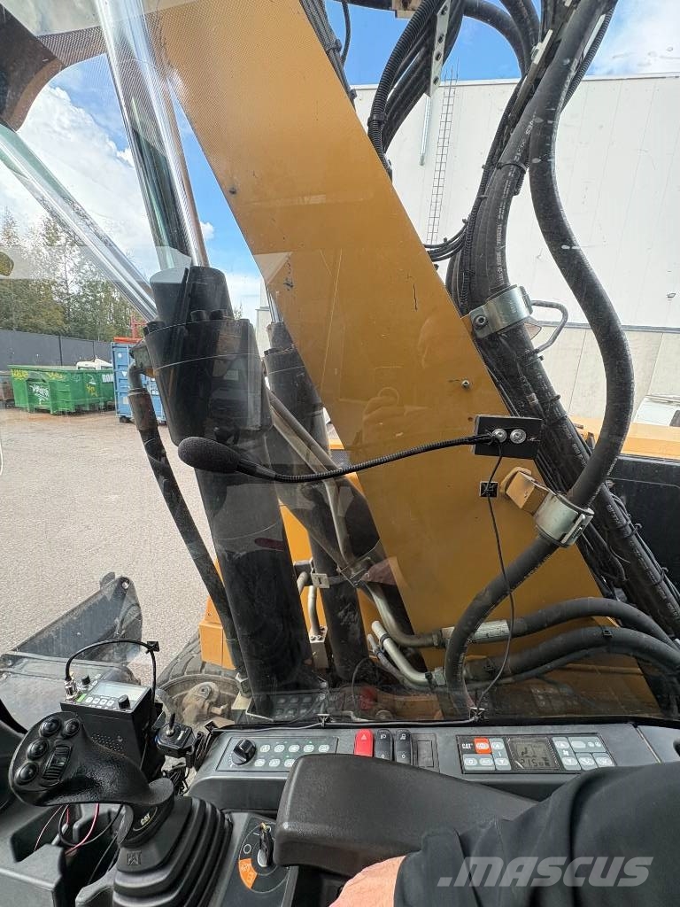 CAT M 317 حفارات بعجل