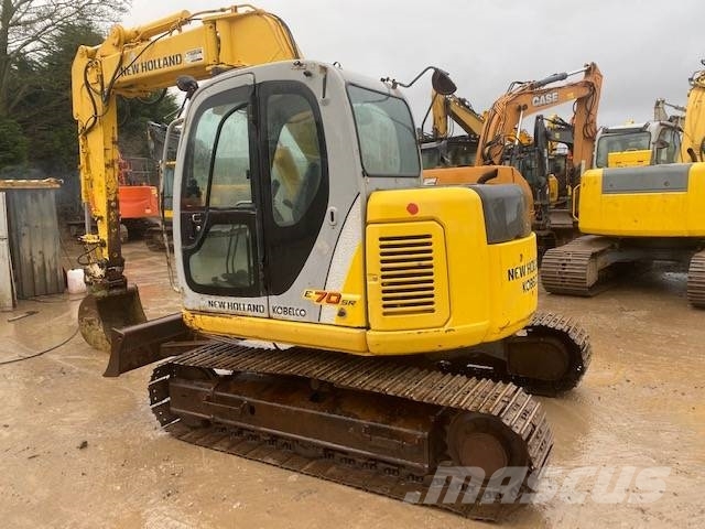 New Holland E 70 SR حفارات وسط 7 طن - 12 طن