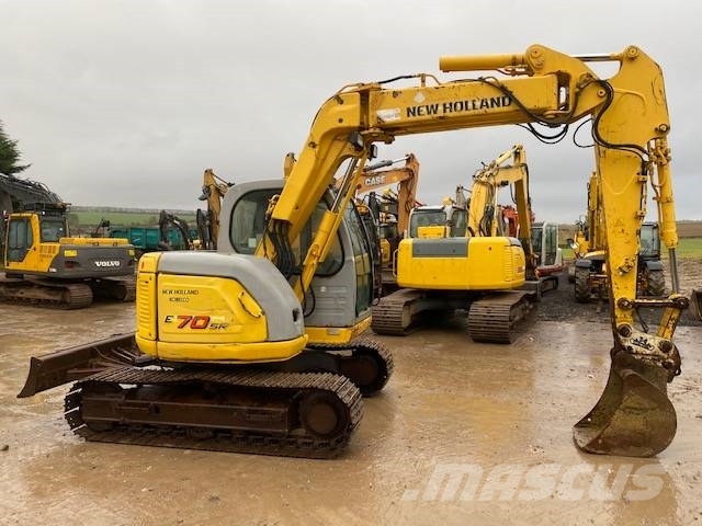 New Holland E 70 SR حفارات وسط 7 طن - 12 طن