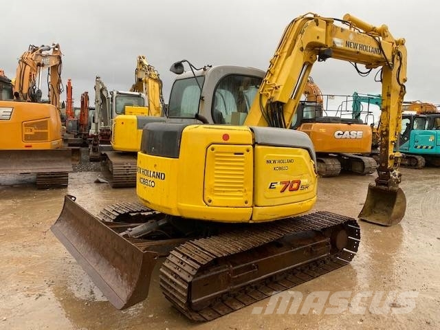 New Holland E 70 SR حفارات وسط 7 طن - 12 طن