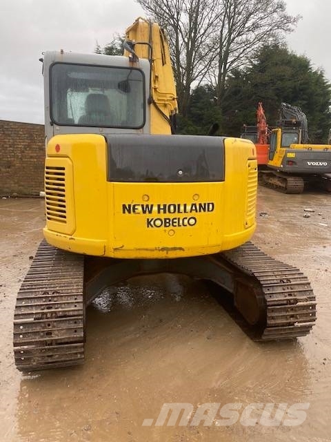 New Holland E 70 SR حفارات وسط 7 طن - 12 طن