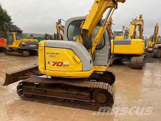 New Holland E 70 SR حفارات وسط 7 طن - 12 طن