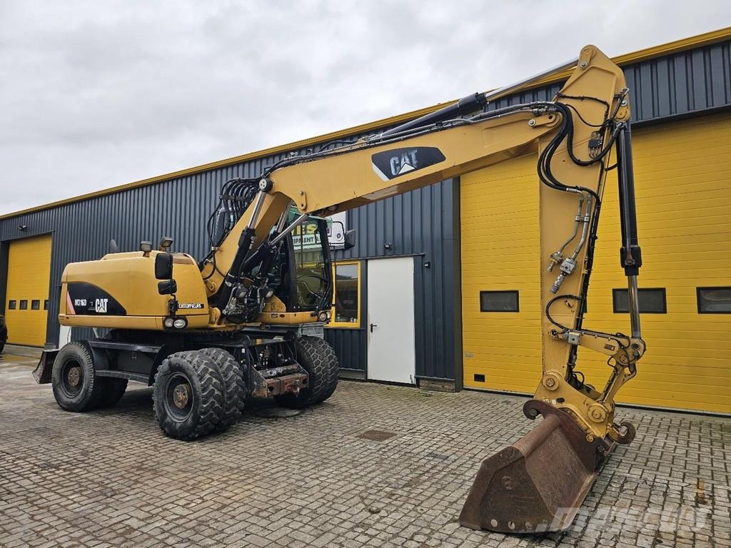 CAT M316D Ekskavatori uz riteņiem