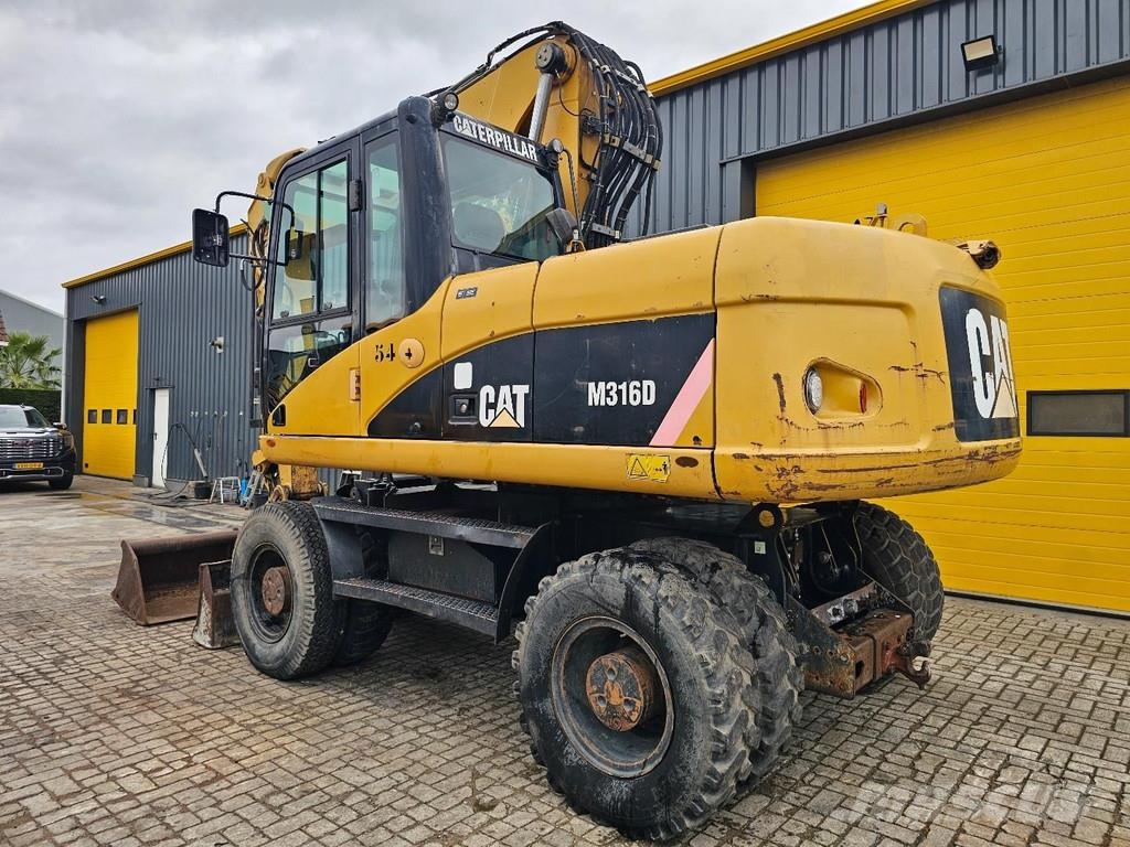 CAT M316D Ekskavatori uz riteņiem