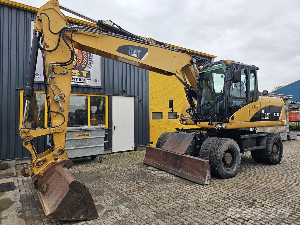 CAT M316D Ekskavatori uz riteņiem
