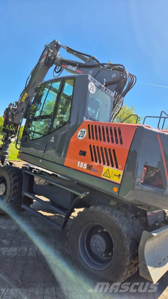 Atlas 155W mit OilQuick OQ65 Mobilbagger