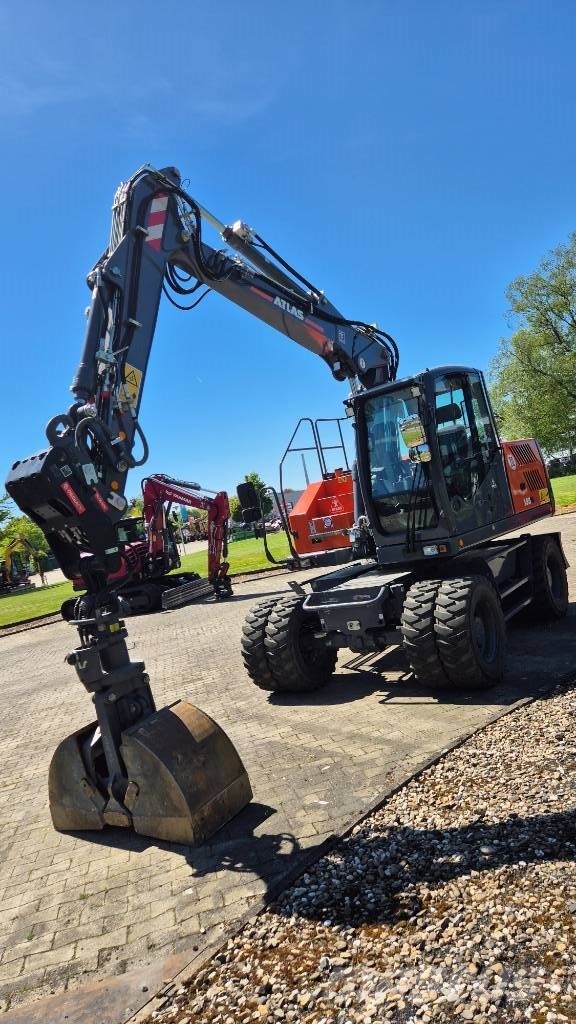 Atlas 155W mit OilQuick OQ65 Mobilbagger