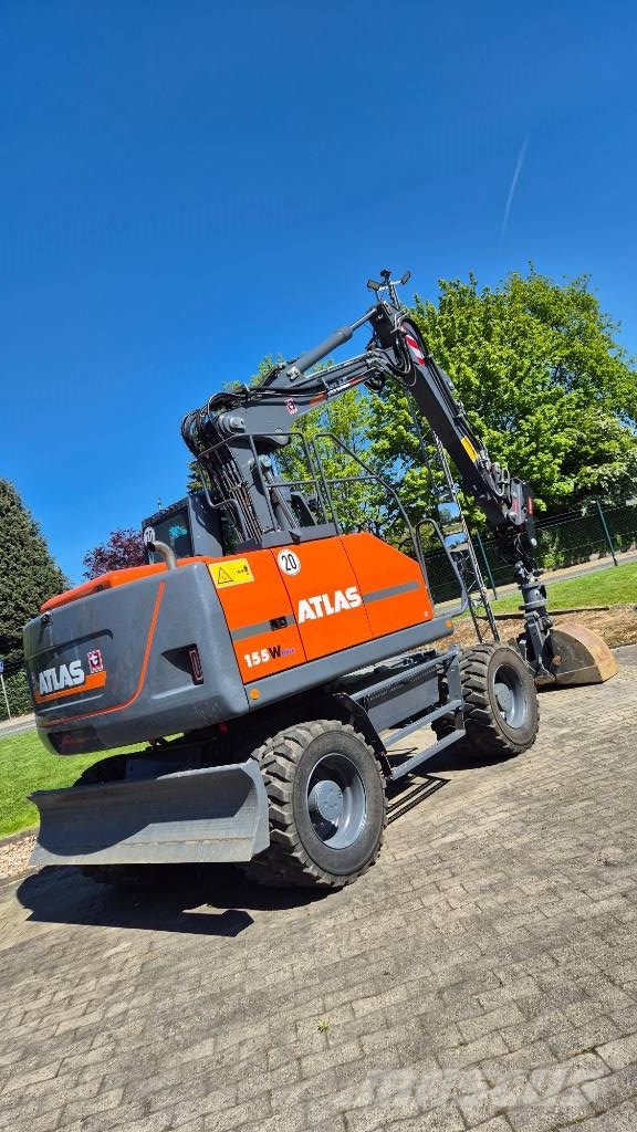 Atlas 155W mit OilQuick OQ65 Mobilbagger