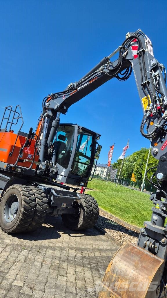 Atlas 155W mit OilQuick OQ65 Mobilbagger