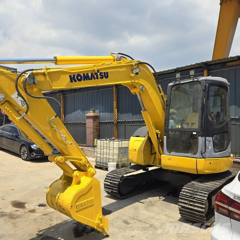 Komatsu PC 78 US Середні екскаватори 7т. - 12т.