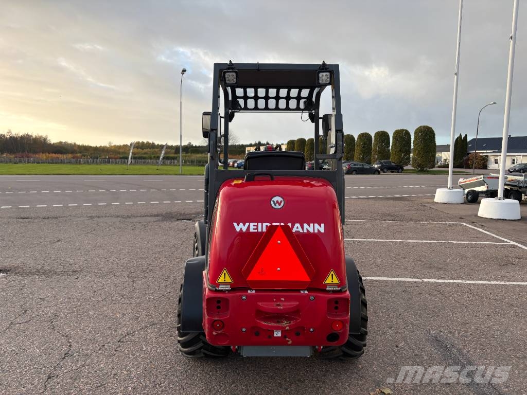 Weidemann 1280 لوادر صغيرة