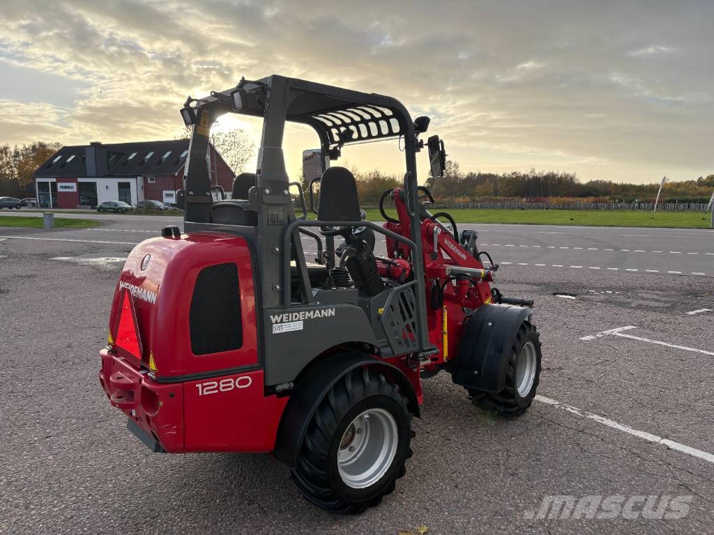Weidemann 1280 لوادر صغيرة