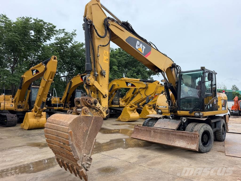 CAT M320D Bagri na kolesih