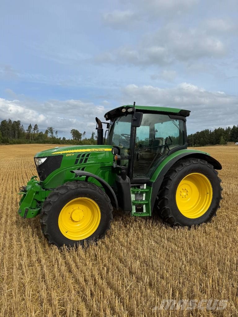 John Deere 6115R الجرارات