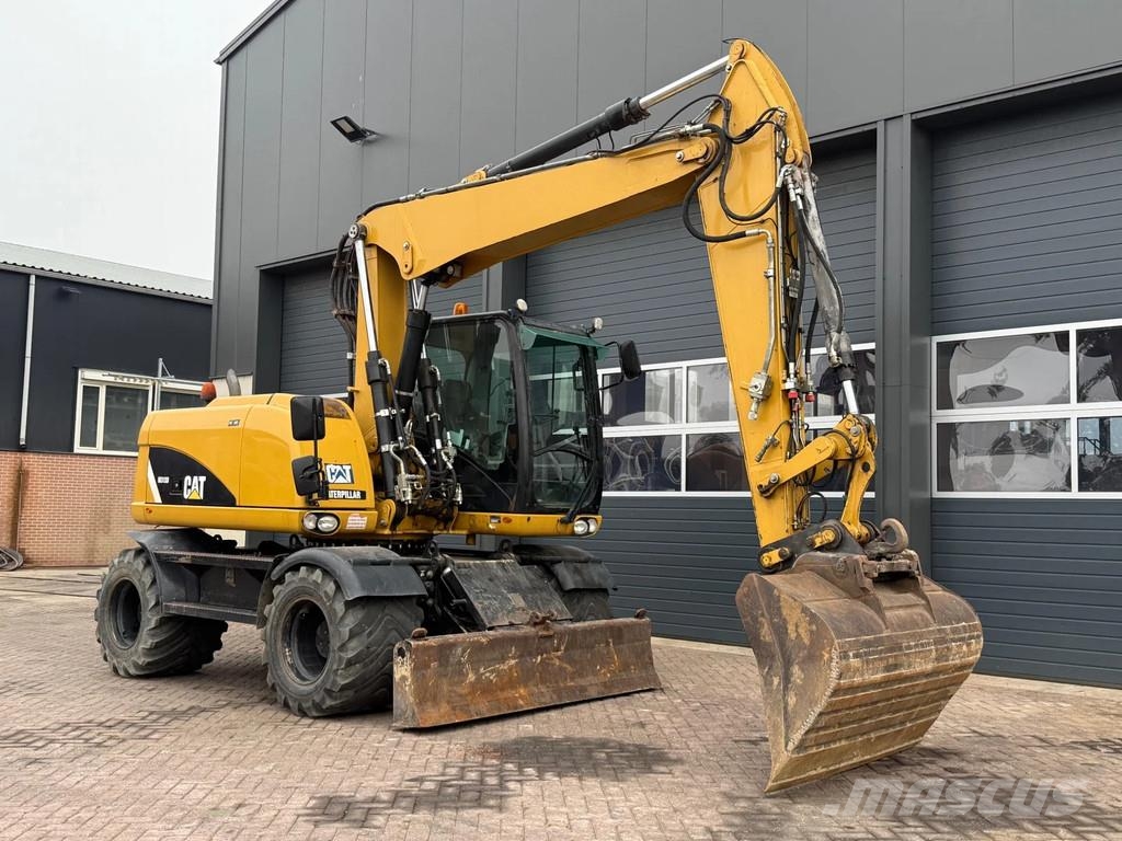 CAT M313D Wielgraafmachines