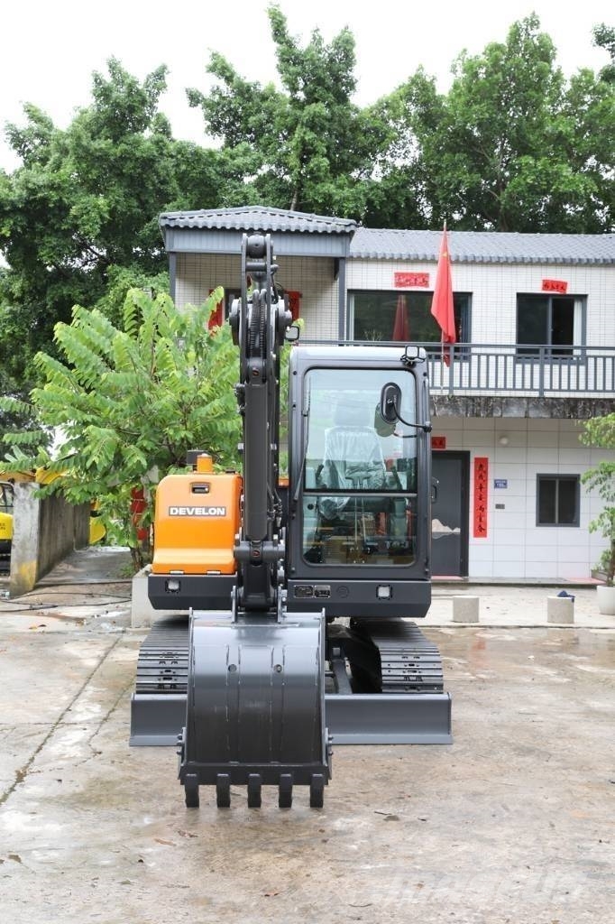 Develon DX 60 D Wielgraafmachines