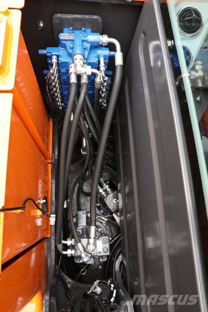 Develon DX 60 D Wielgraafmachines