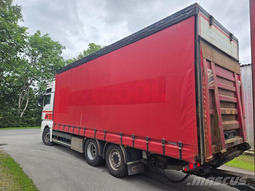 MAN TGX 26.460 6X2 + 2012 HFR TRAILER Caminhões com cortinas laterais