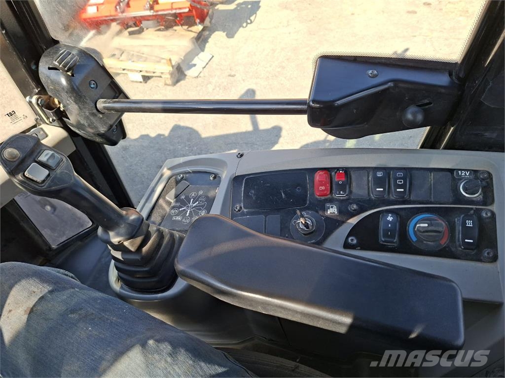 CAT 908M لوادر بعجل