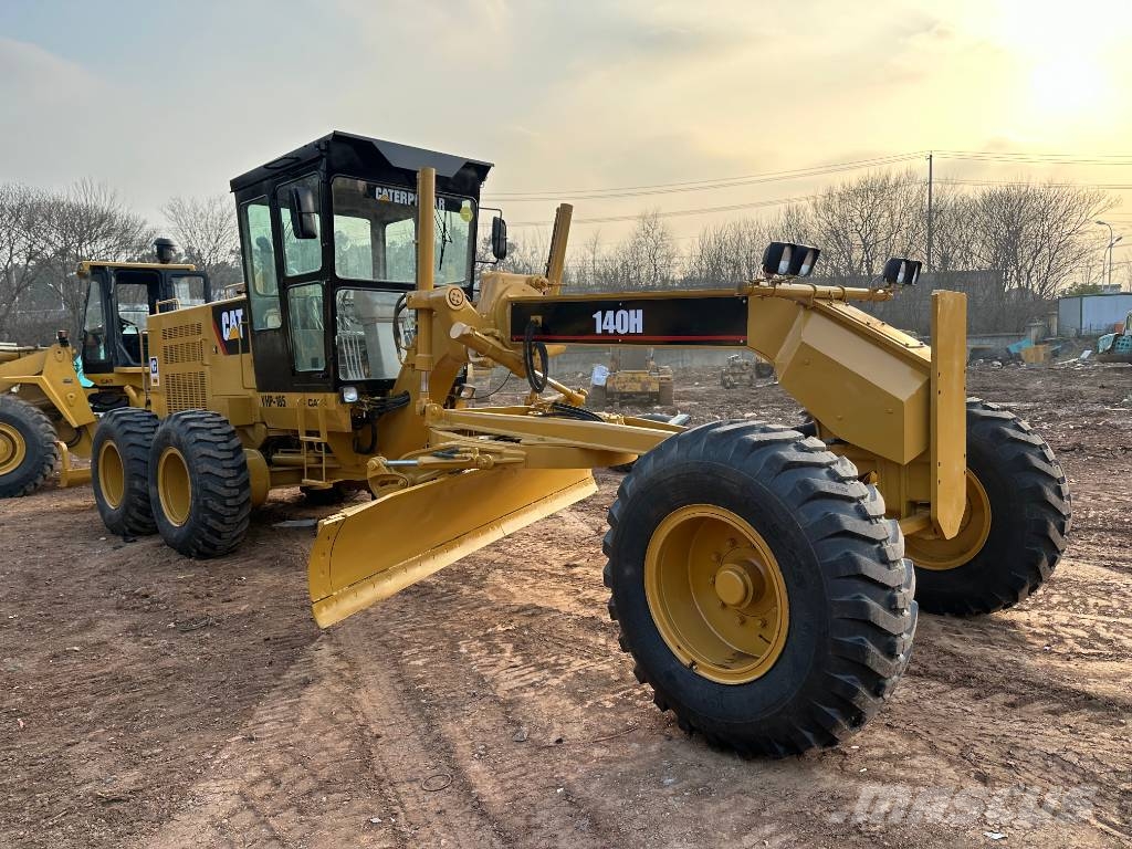 CAT 140H Grederji